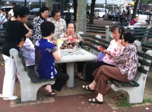 asian women playing cards